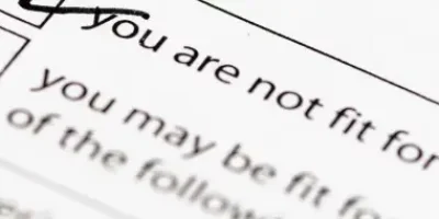 Close-up of 'You are not fit for work' form